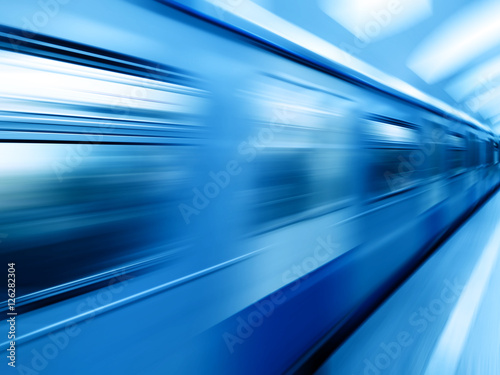 Diagonal blue motion blur metro train background