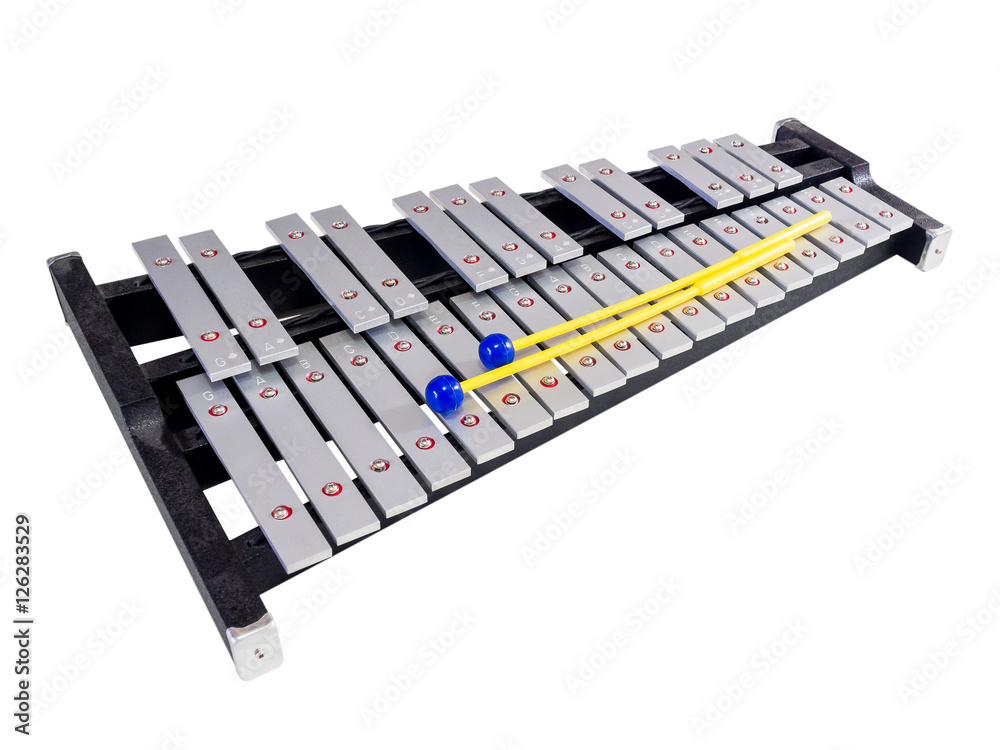 Xylophone with mallets on isolated white background, selective f Xylophone with mallets on isolated white background, selective f