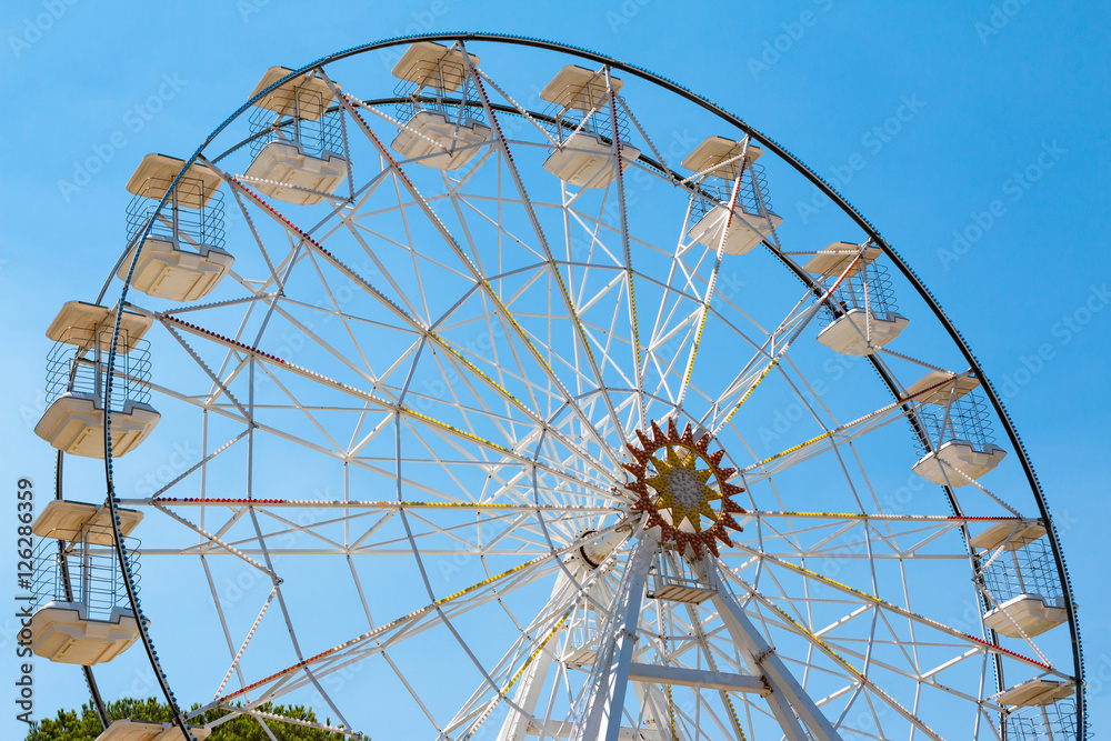 Ferris wheel in blue sky
Ferris wheel in blue sky
