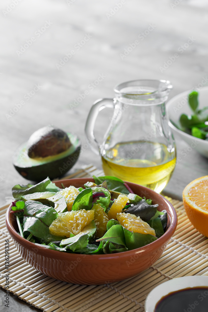 Fresh salad with avocado and orange Fresh salad with avocado and orange