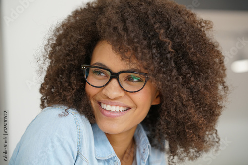 Portrait of attractive mixed-race woman with eyeglasses