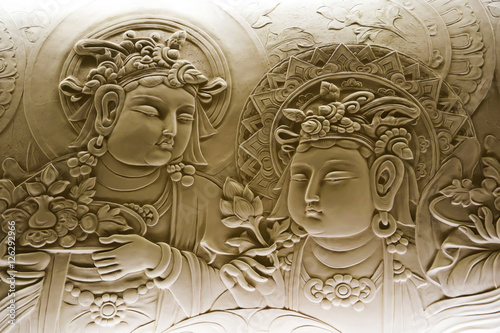 Stone bas -relief of Buddha. photo