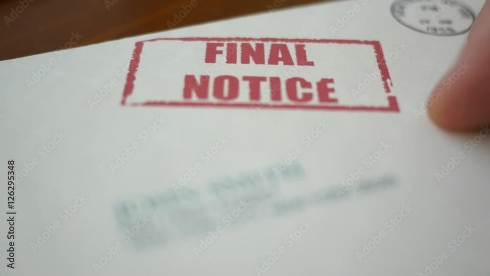 A man looking at final notice foreclosure letter from bank
