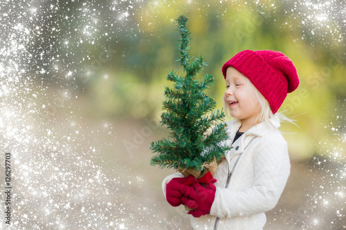 Baby Girl In Red Mittens an...