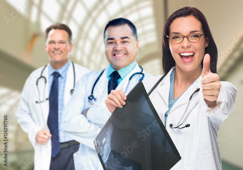 Doctors or Nurses With Thum...