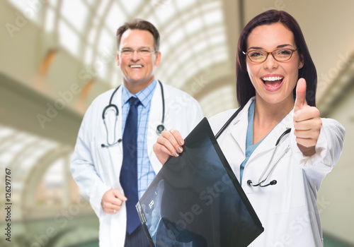 Doctors or Nurses With Thum...