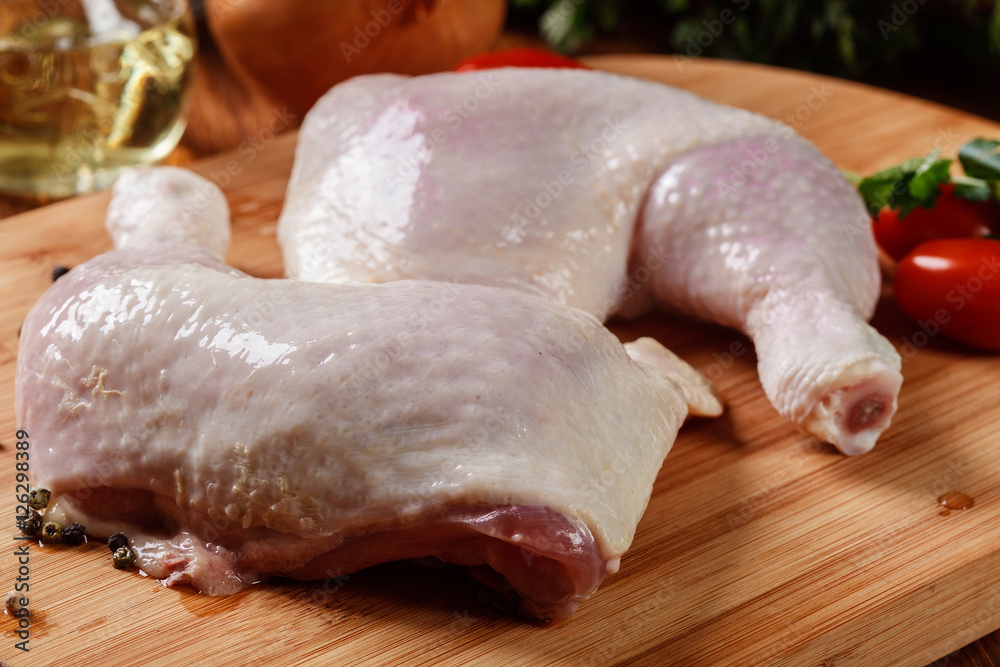 Raw chicken legs and marinade ingredients