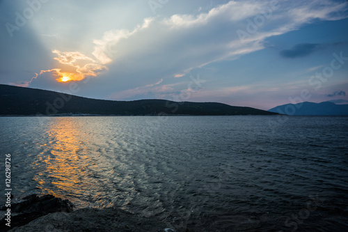 Beautiful Zastani beach at sunset, Evia, Greece photo