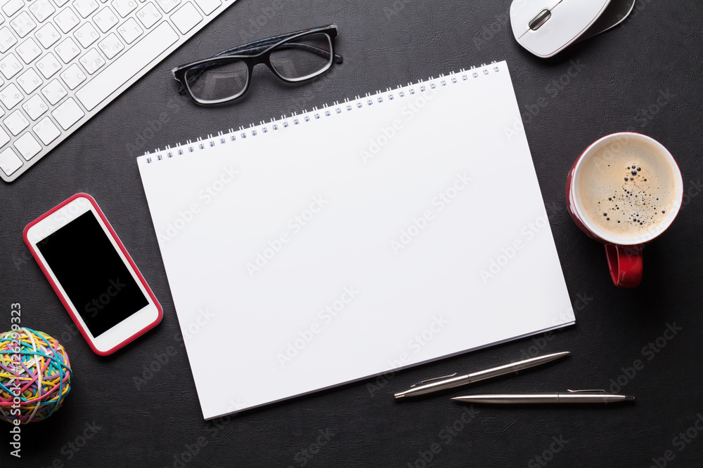 Office desk table with pc, notepad, glasses, coffee and phone Office desk table with pc, notepad, glasses, coffee and phone