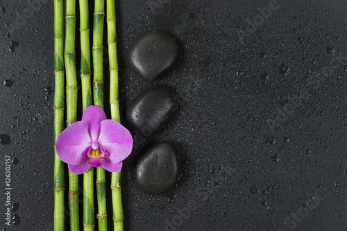 Spa concept with zen stones  orchid flower and bamboo