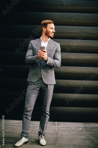 Tableau sur toile Businessman with phone