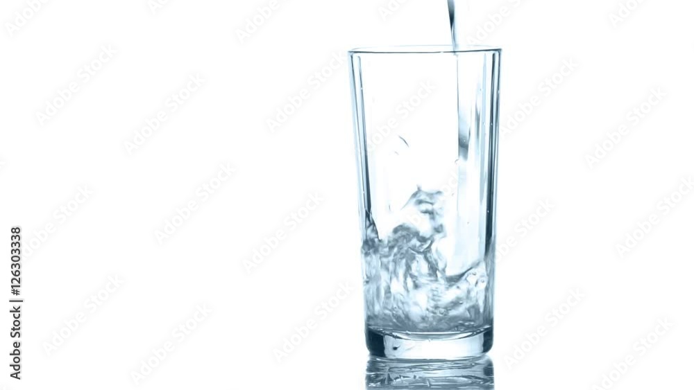 Pouring clean water into the glass. Closeup on white background. Slow motion
Pouring clean water into the glass. Closeup on white background. Slow motion