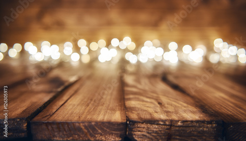 lights on wooden rustic background photo