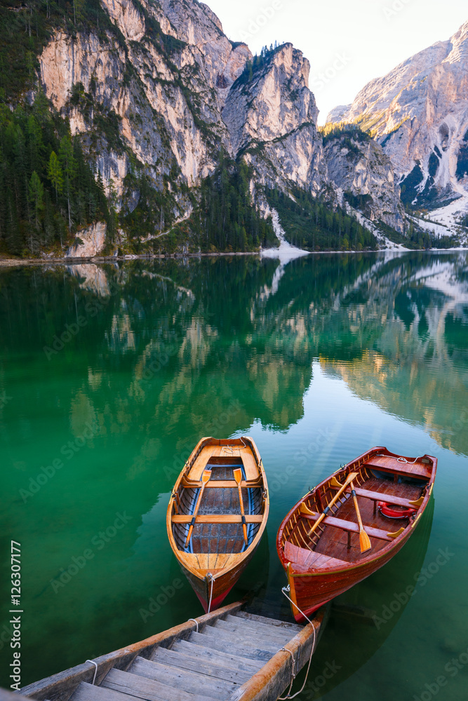 Fototapeta premium Boats on the Braies Lake ( Pragser Wildsee ) in Dolomites mounta