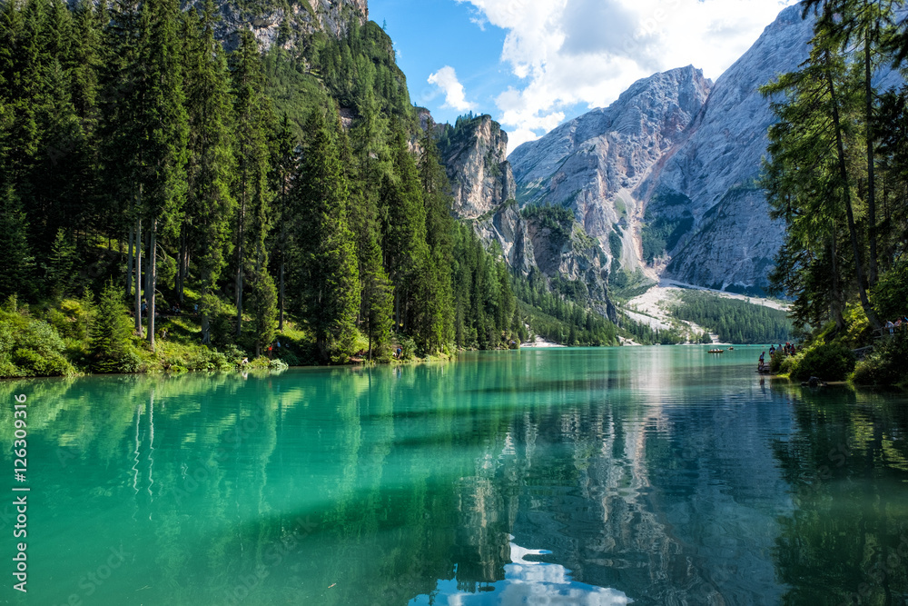 View of scenic turquoise Lake Braies in the Dolomites with the mountain in the background, Sudtirol, Italy. 
