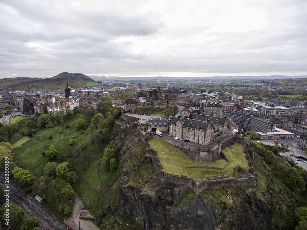 Edinburgh city historic Castle on Rock cloudy Day Aerial shot