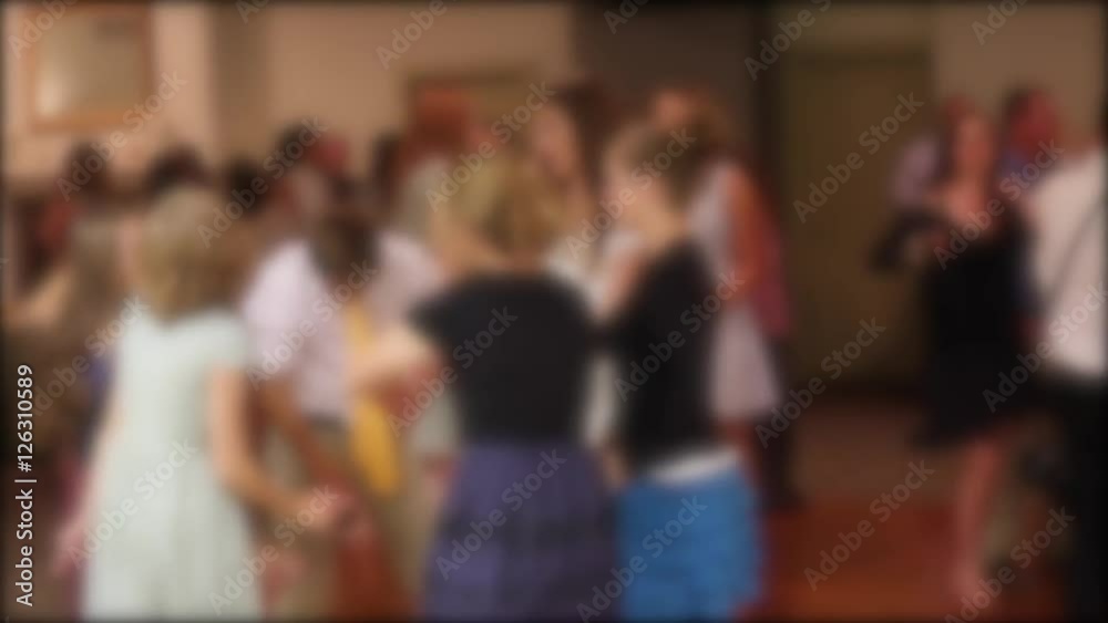 People dance at a wedding reception People dance at a wedding reception