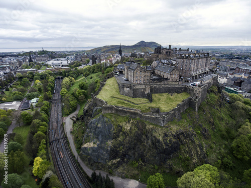 Edinburgh city historic Castle on Rock cloudy Day Aerial shot 5