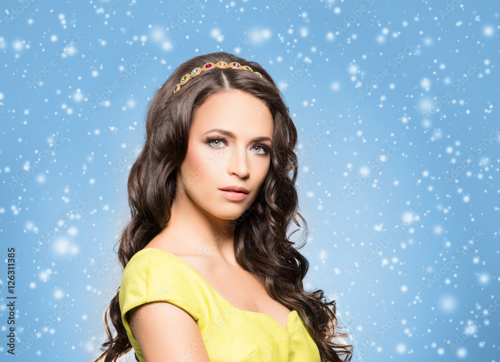Young brunette woman in jewelry and a white dress Young brunette woman in jewelry and a white dress