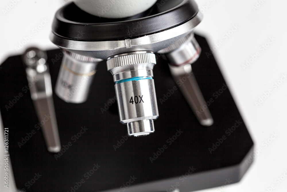 close up macro microscope on white background close up macro microscope on white background