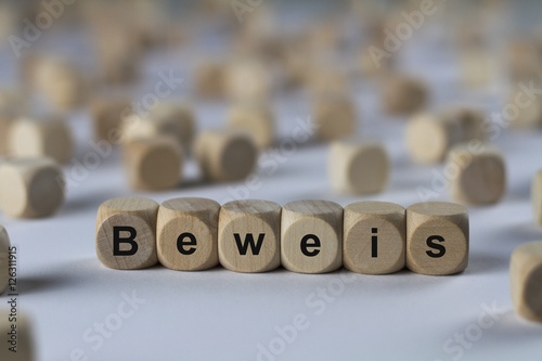 Beweis - Holzwürfel mit Buchstaben photo