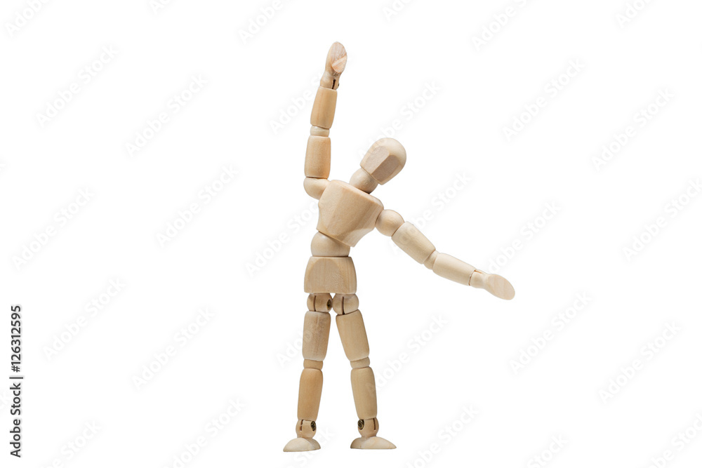 Wooden man practices yoga and fitness Wooden man practices yoga and fitness