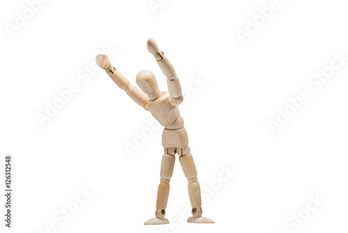 Wooden man practices yoga and fitness