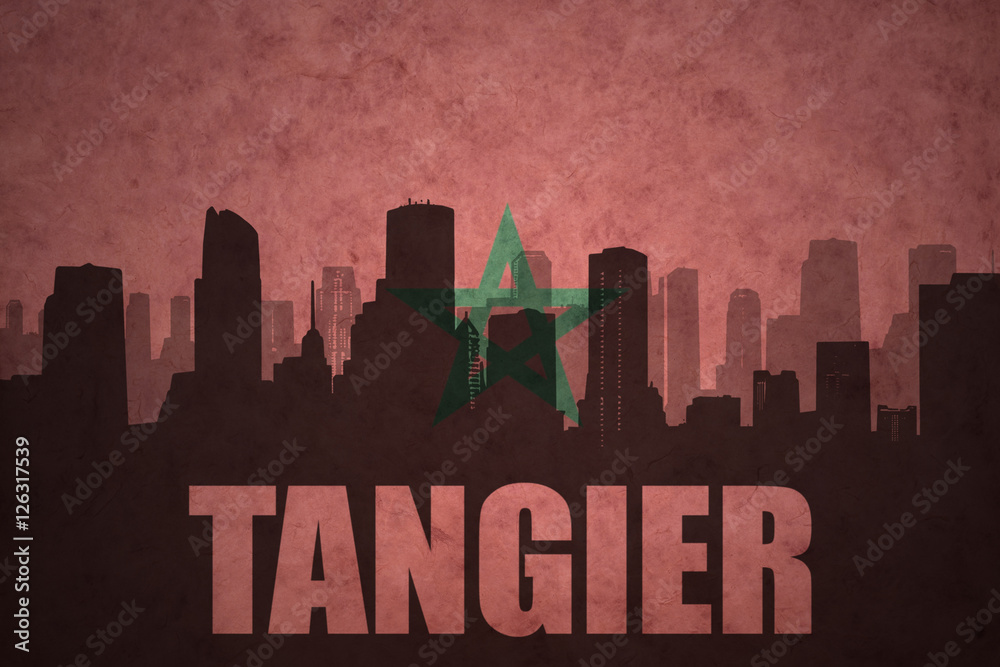 abstract silhouette of the city with text Tangier at the vintage moroccan flag