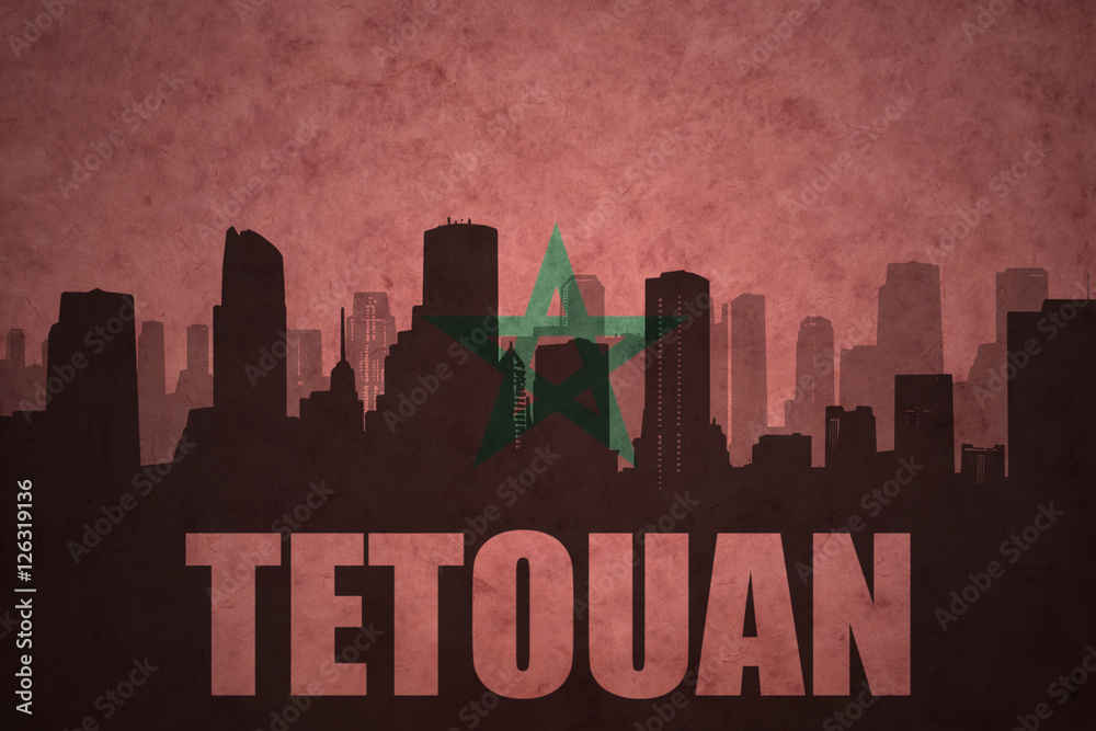 abstract silhouette of the city with text Tetouan at the vintage moroccan flag