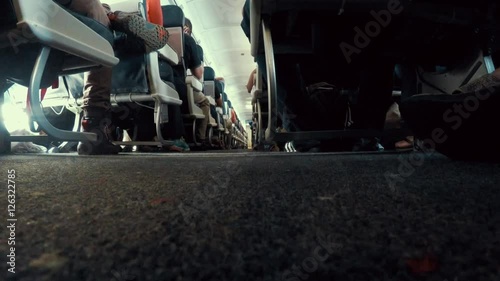 Wallpaper Mural Passengers sitting and flying in the commercial airplane Torontodigital.ca