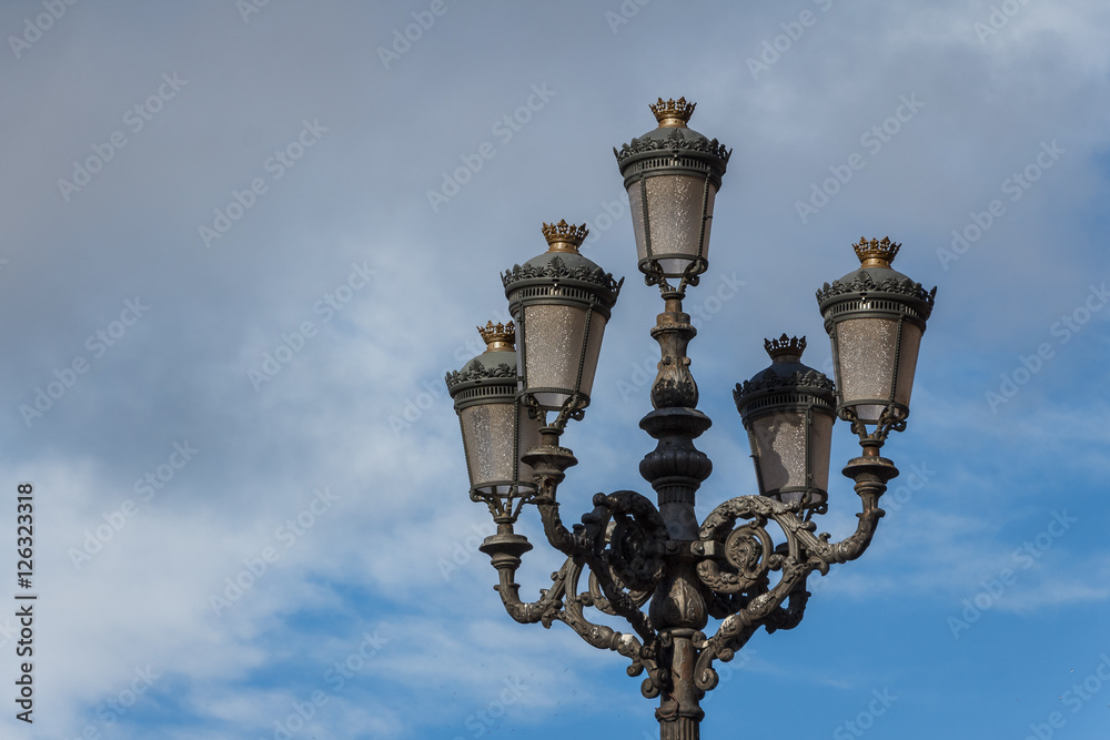 Old lantern in the center of Madrid, Spain