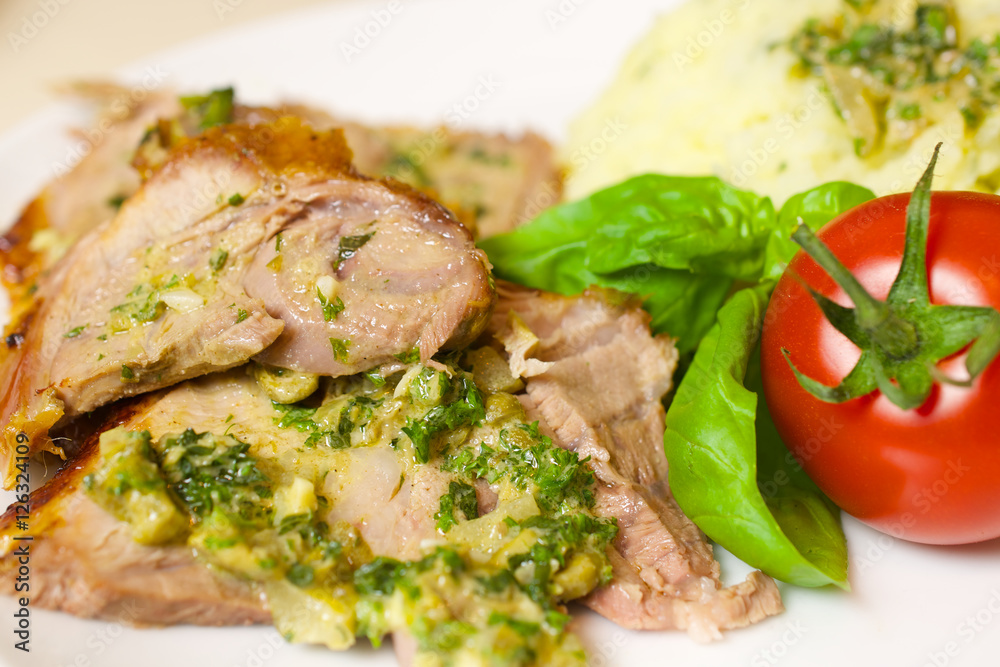 Leg of lamb with mint sauce. Baked meat and vegetables