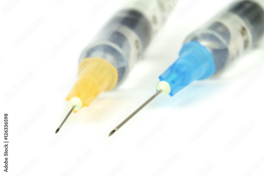 Medical syringes with injection solution. Macro image. Medical syringes with injection solution. Macro image.