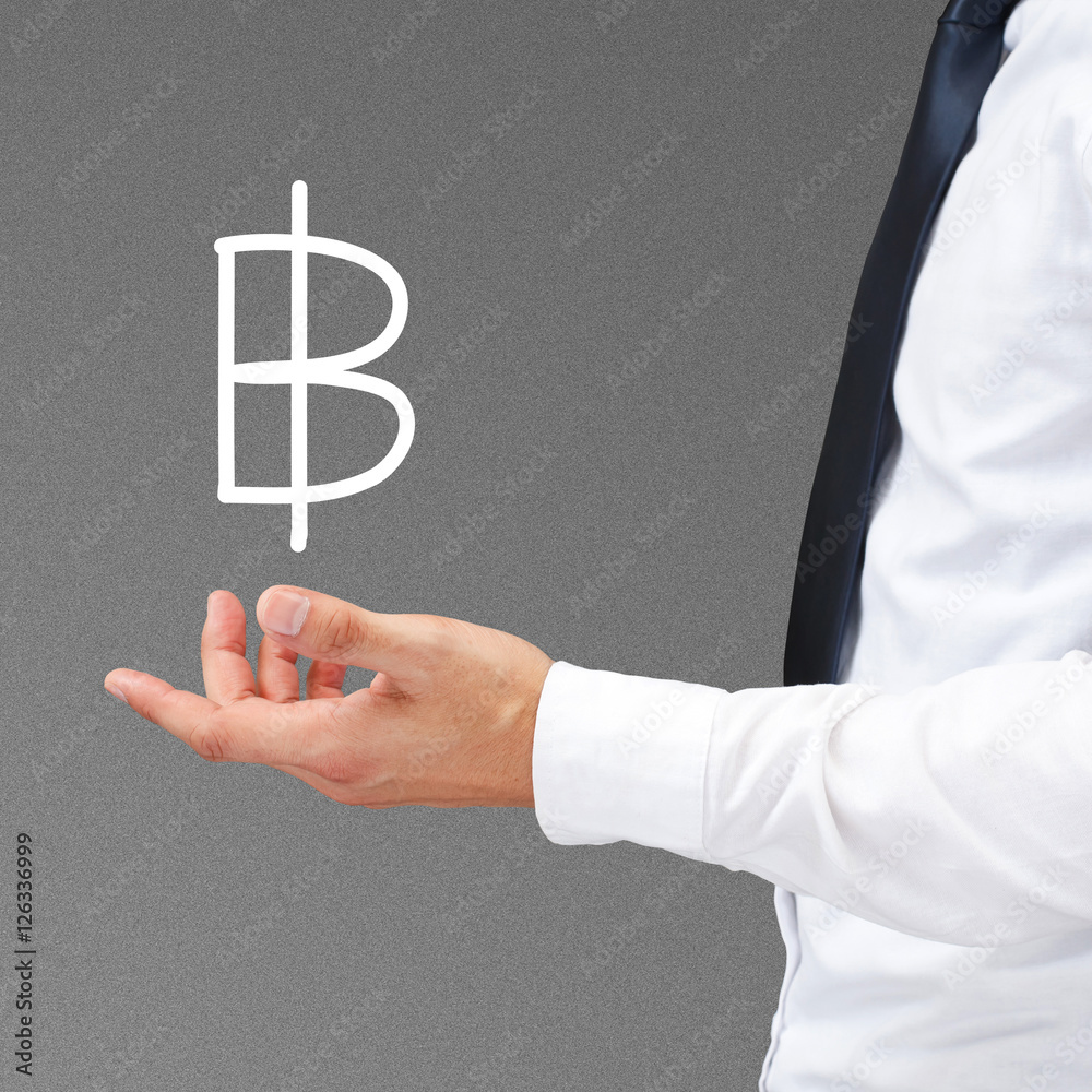 Baht sign on businessman hand.Thailand money. Baht sign on businessman hand.Thailand money.