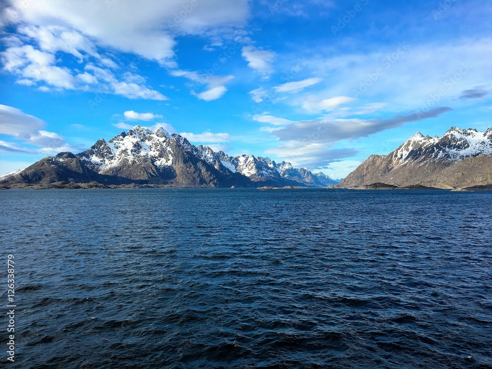 Beautiful coastal landscape in Lofoten archipelago in Nordland county. The photo is taken from a boat just east of the city of Svolvaer, the 