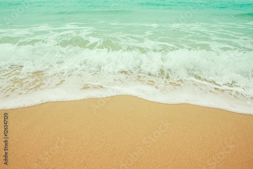 Wave on the sandy beach