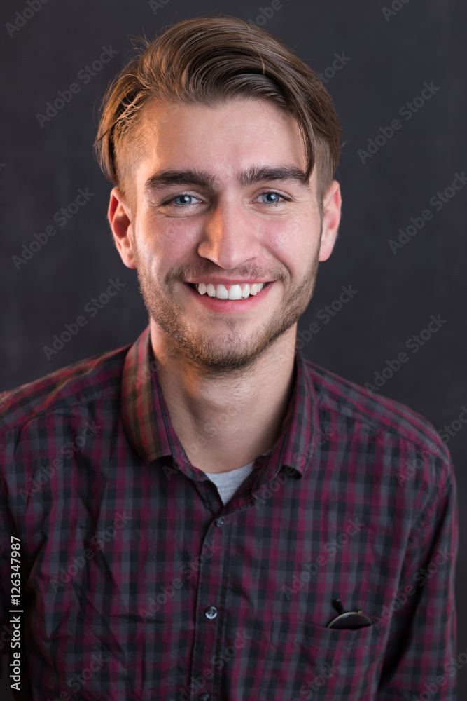 Fototapeta premium portrait of young startup businessman at modern office, chalkboa