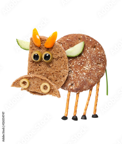 Cow made of bread on isolated background