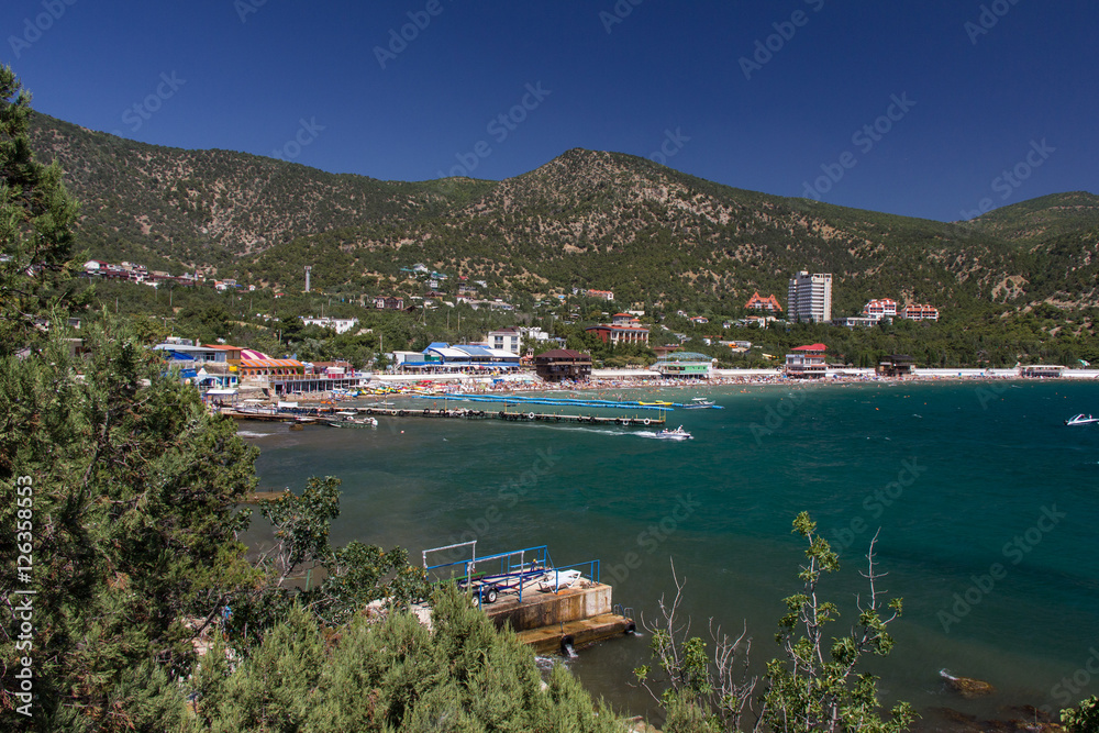 The beach at the sea bay. The coast of the peninsula of Crimea.