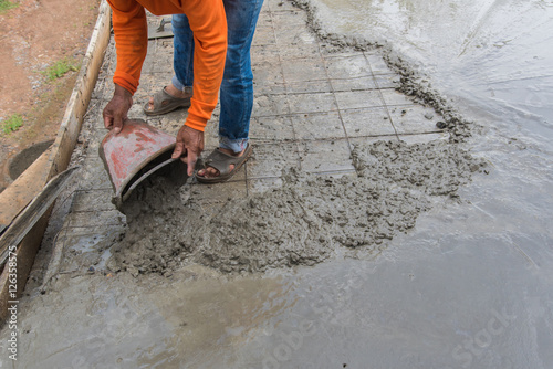 Concrete pouring during commercial concreting floors of buildings in construction