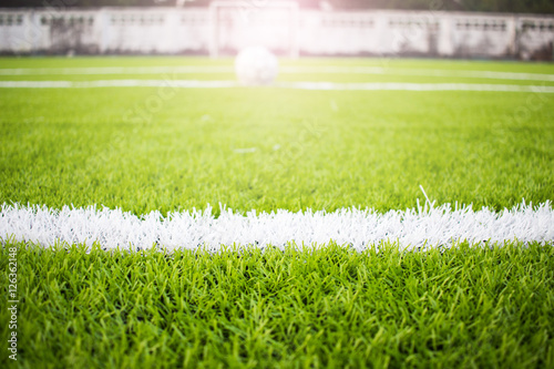 Artificial turf football field green white grid photo