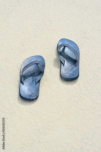 Summer vacation concept--Flipflops on a sandy ocean beach