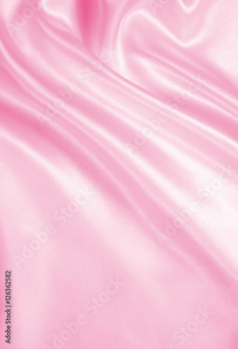 Smooth elegant pink silk or satin as wedding background