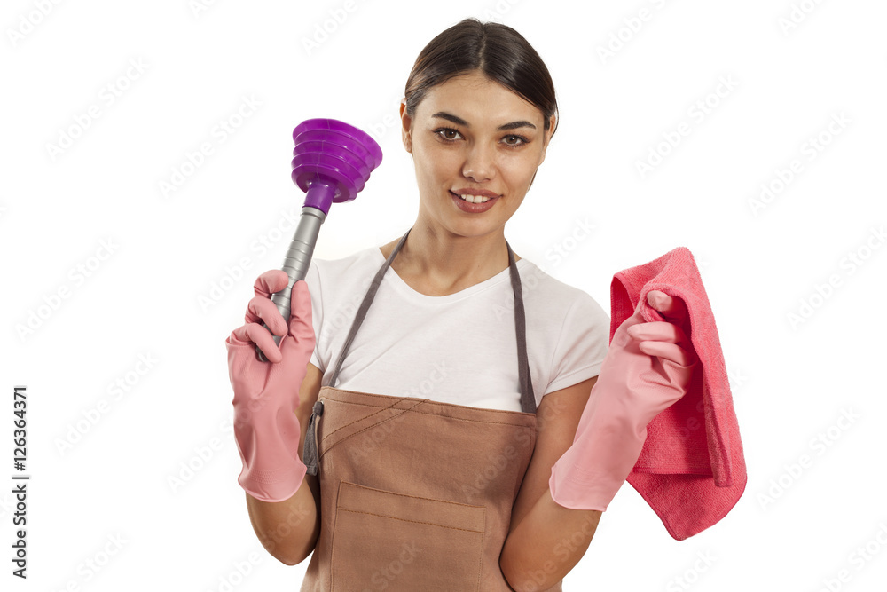 Young woman with cleaning supplies on white background Young woman with cleaning supplies on white background
