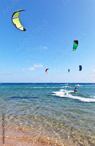 Kitesurfing on the Prassonissi beach at Rhodes Island, Greece