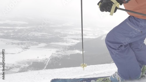 upclow slow motion ski turn on powdery groomer