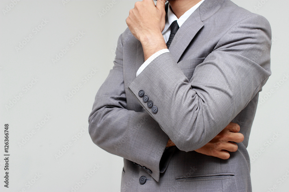 Businessman feeling strong over background Businessman feeling strong over background