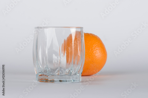 Obraz na płótnie Orange with glass 
