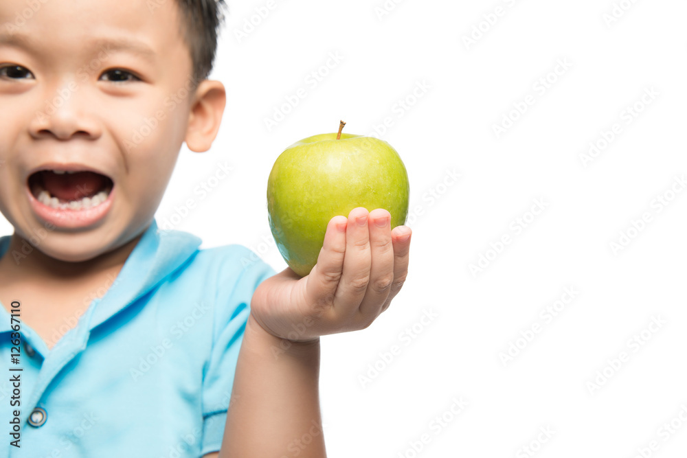 Asian baby boy holding and eating red apple, isolated on white Asian baby boy holding and eating red apple, isolated on white