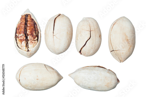 Set of Brown pecans piles isolated on a white background